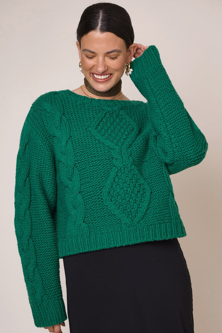 green knit jumper