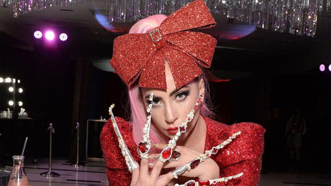 lady gaga wearing pink red and white claw nail rings designer by lillian shalom