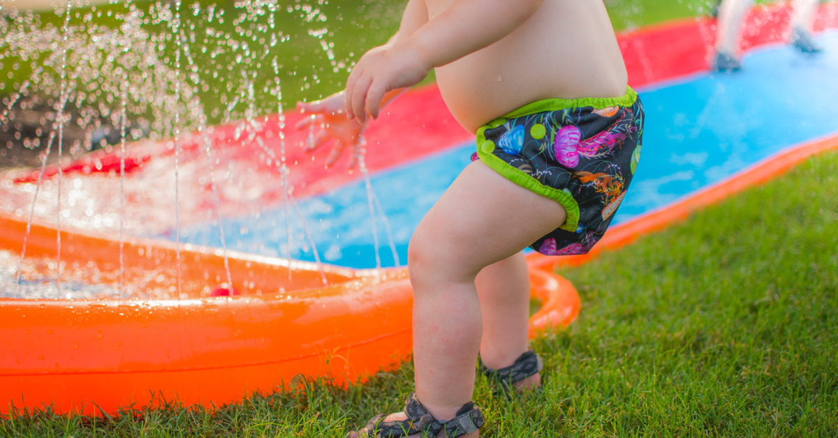 baby playing in a small pool