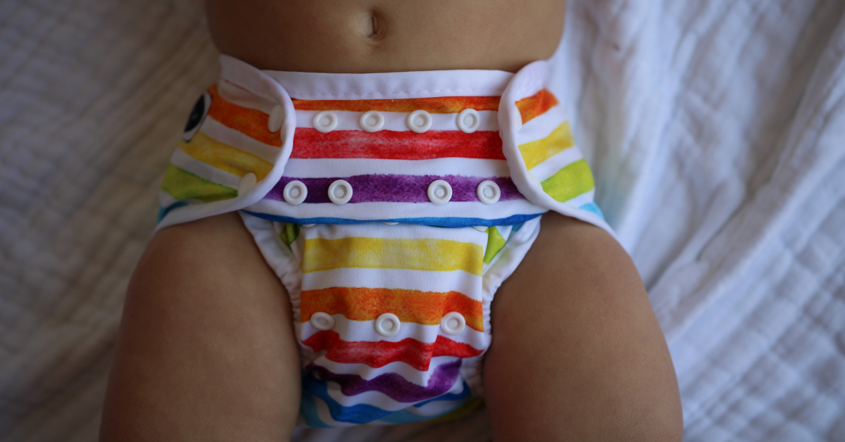 baby wearing cloth diaper