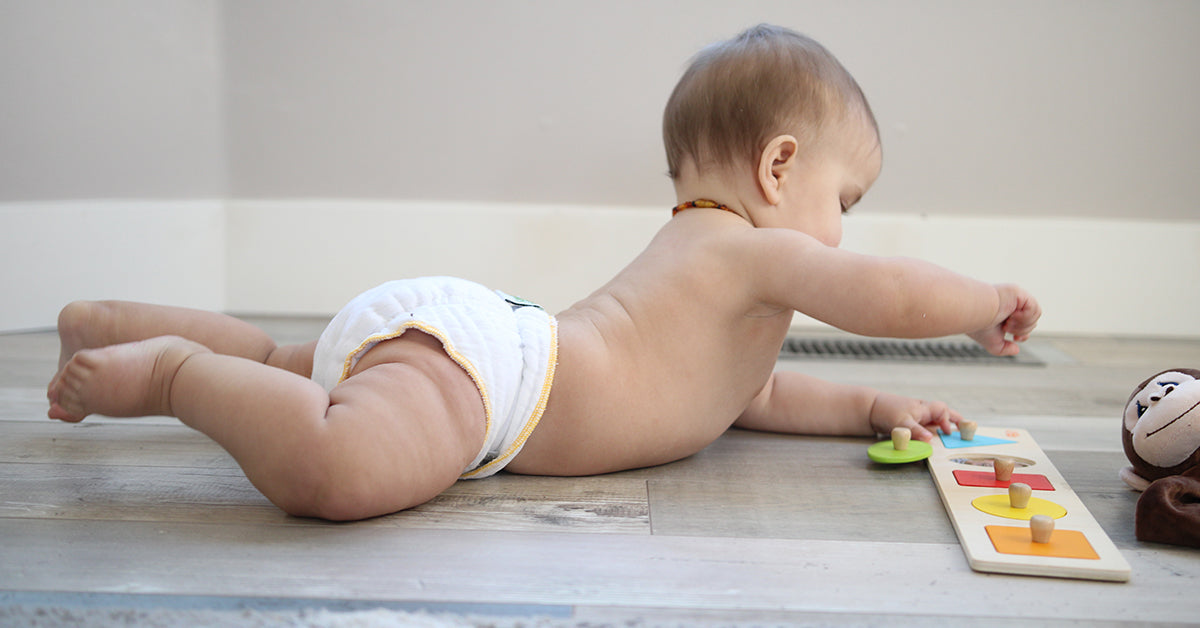 tummy time with baby in a nicki's diapers fitted cloth diaper