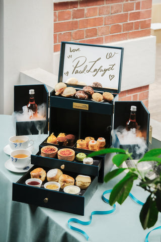 Tea set with many fine pastries