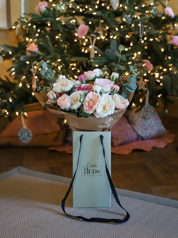 Christmas gift of faux rose arrangement
