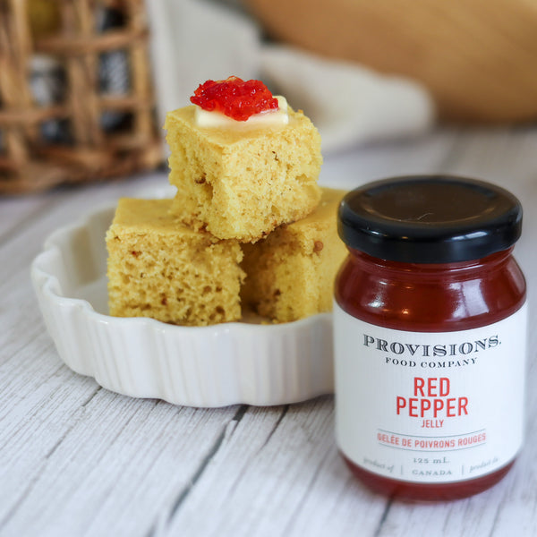 cornbread topped with Provisions Red Pepper Jelly