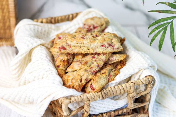 Freshly baked Raspberry White Chocolate Scones in a basket