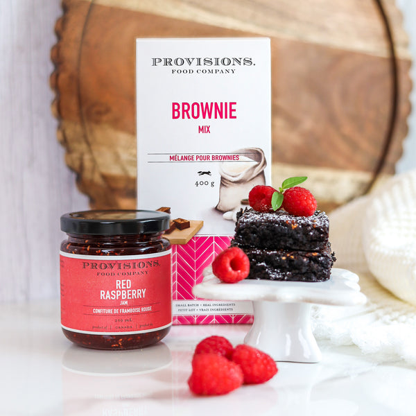 Brownie Mix Box and Raspberry Jam beside freshly baked Raspberry Jam Brownies