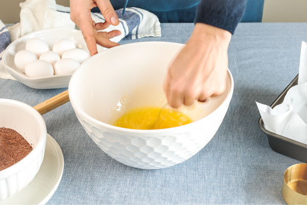 Whisking an egg in a bowl