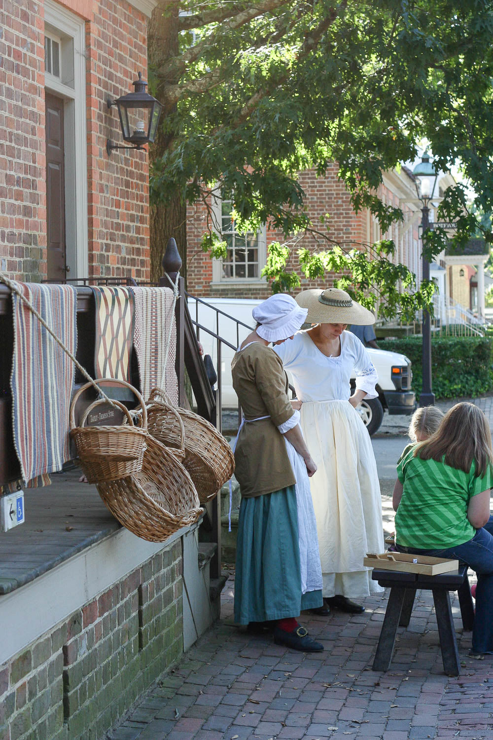 Women doing an 18th century historical reenactment