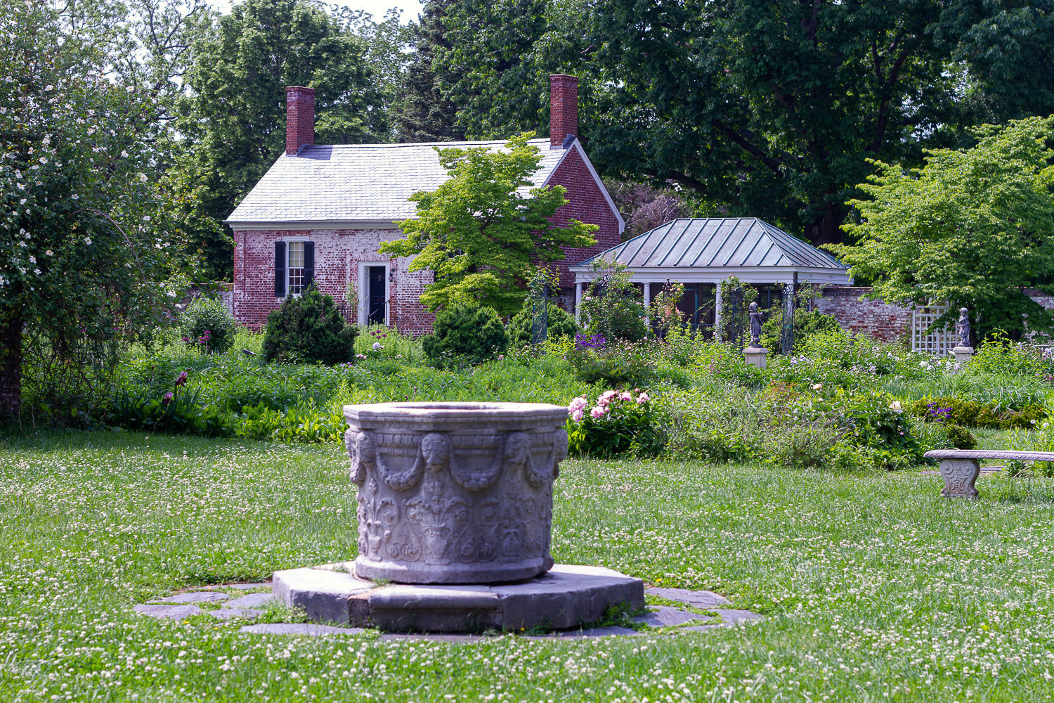 brick cottage with summer house and gardens