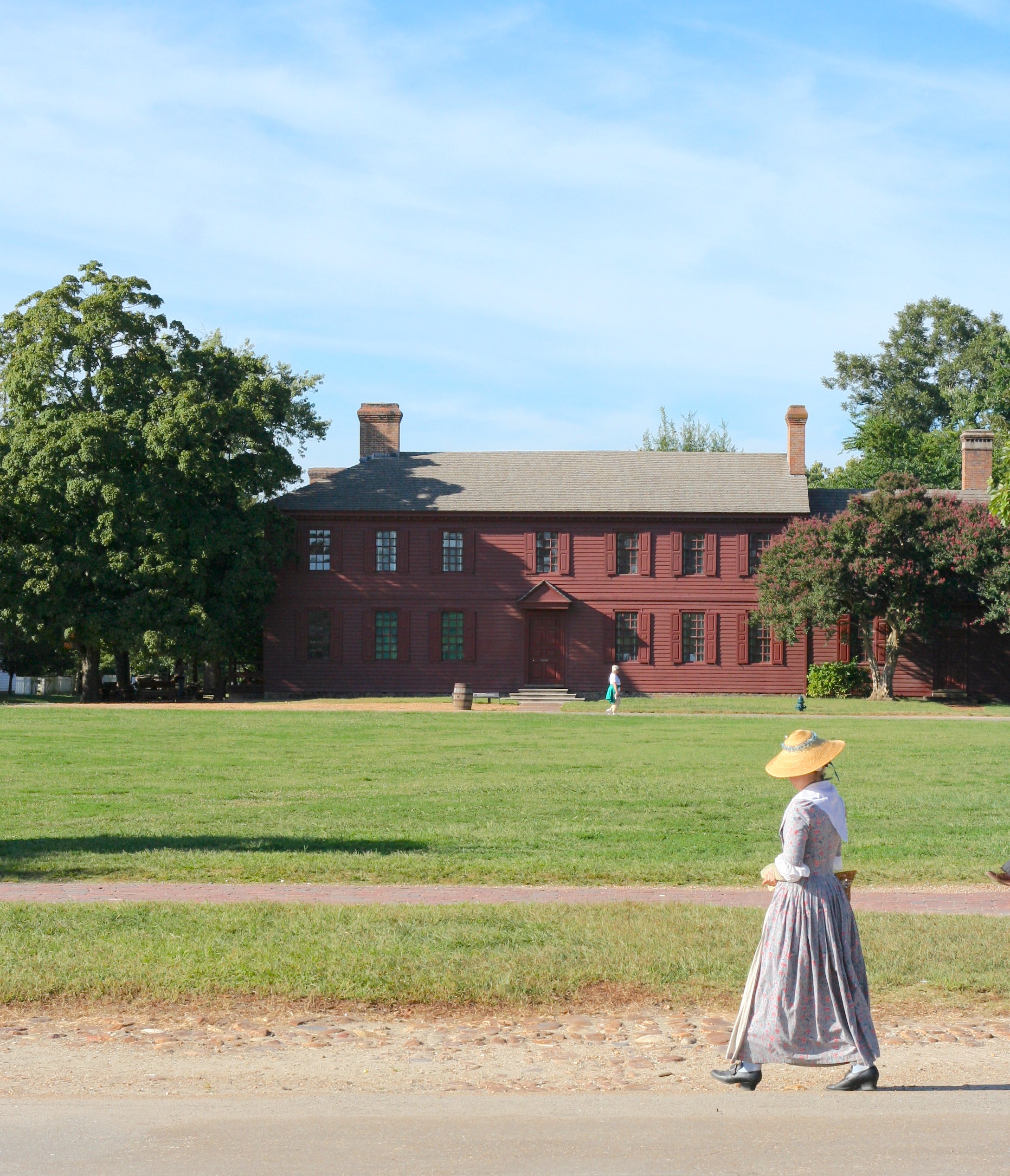 Woman in 18th century dress walking at Colonial Williamsburg