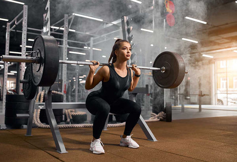 woman powerlifting squat