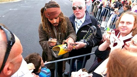 Johnny Depp signing a prostetic leg