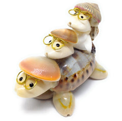 Famille de tortues en coquillages