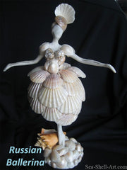 figurine danseuse avec des coquillages