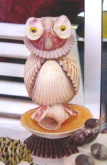 statues hibou coquillages