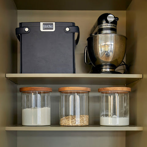 Clear containers and sustainable vegan leather storage bin for kitchen organization