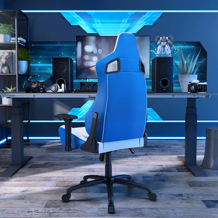 Right angled back view modern blue and white faux leather gaming chair at a desk with accessories