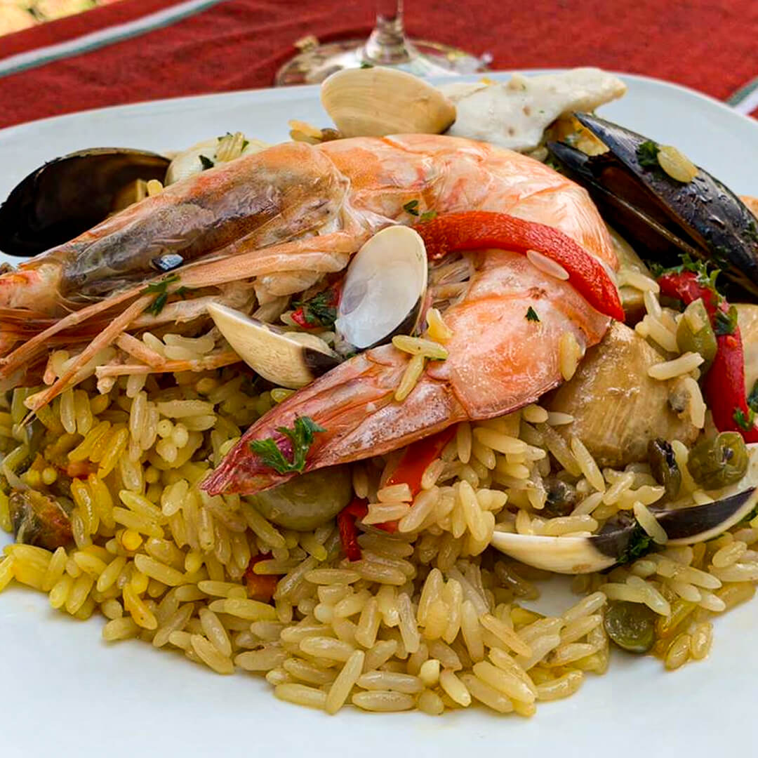 Paella mixta con pollo, cerdo y mariscos | Pescado y Mariscos Franklin