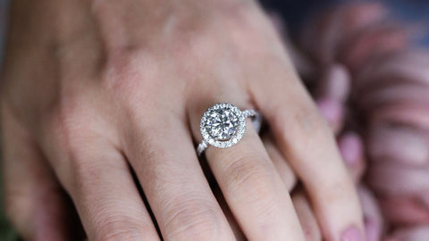 engagement ring on finger