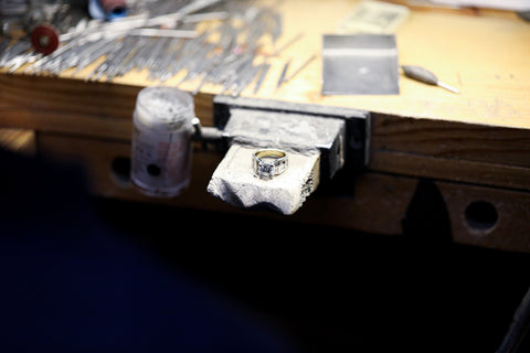 diamond ring on workbench