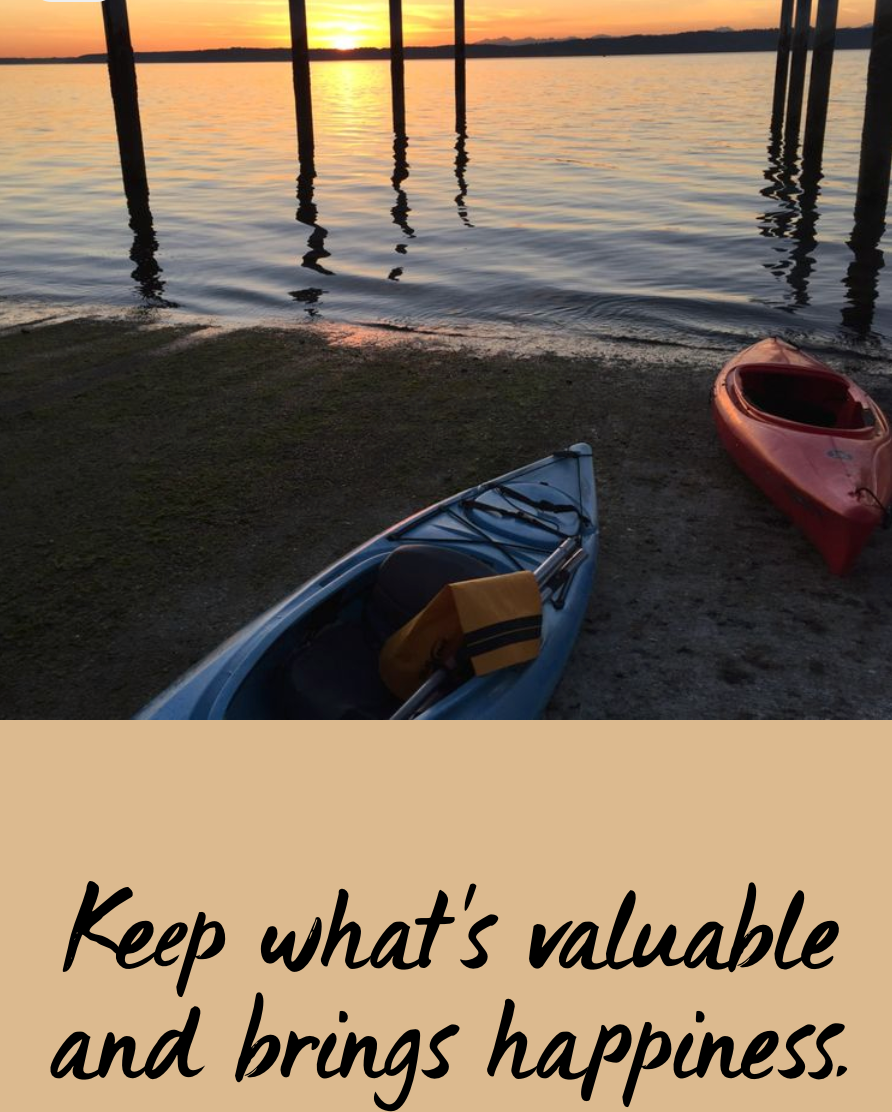 kayaks on shore of Puget Sound at sunset. caption "keep what's valuable and brings happiness"
