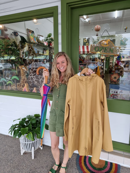 Keep Dry this wet season with our quality adults rain coats and umbrellas at Earth Toys in Cairns North Qld