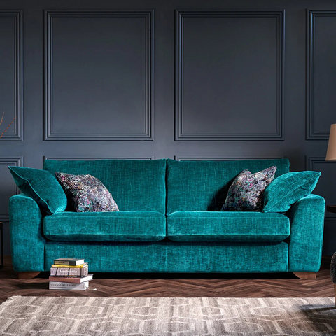 turquoise sofa living room books 