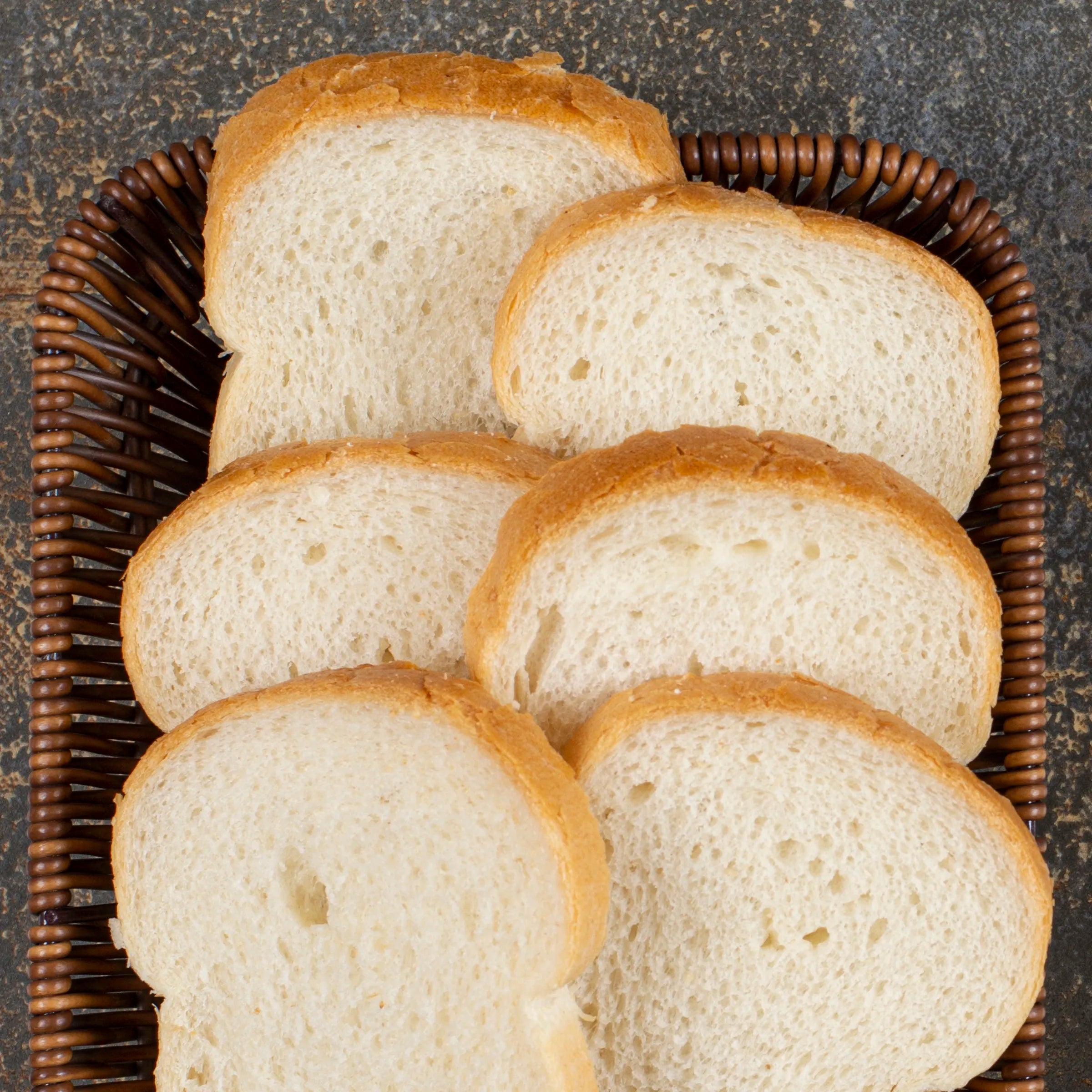 fresh-sliced-bread-wooden-basket.webp__PID:c0e71cd2-59c0-46e8-8d22-75c7040cf0ca