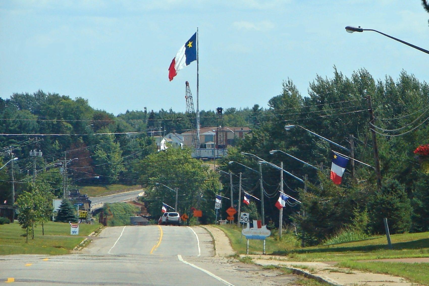 the-worlds-largest-acadian-flag-saint-louis-de-kent-new-v0-ktq6e6yterqc1.jpg__PID:5607706b-518f-461f-a000-c168fe32f294