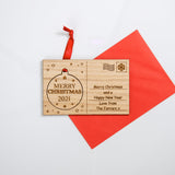 Christmas wooden card with cut out hanging decoration