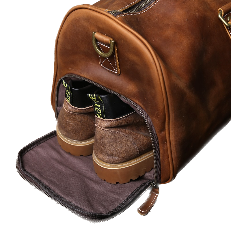 a leather duffel bag with a seperate shoes compartment