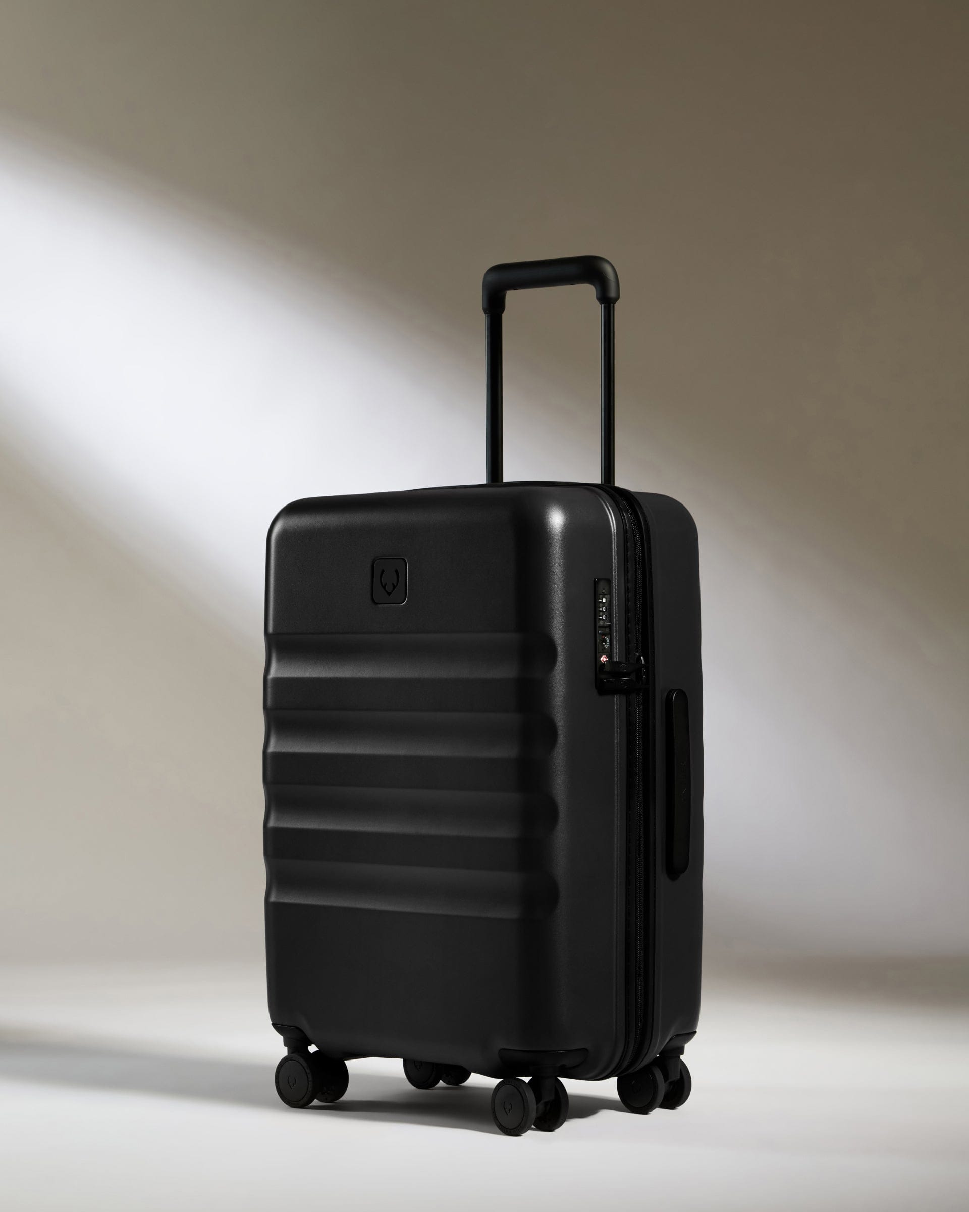 View Antler Icon Stripe Biggest Cabin Suitcase In Black Size 24cm x 58cm x 395cm information