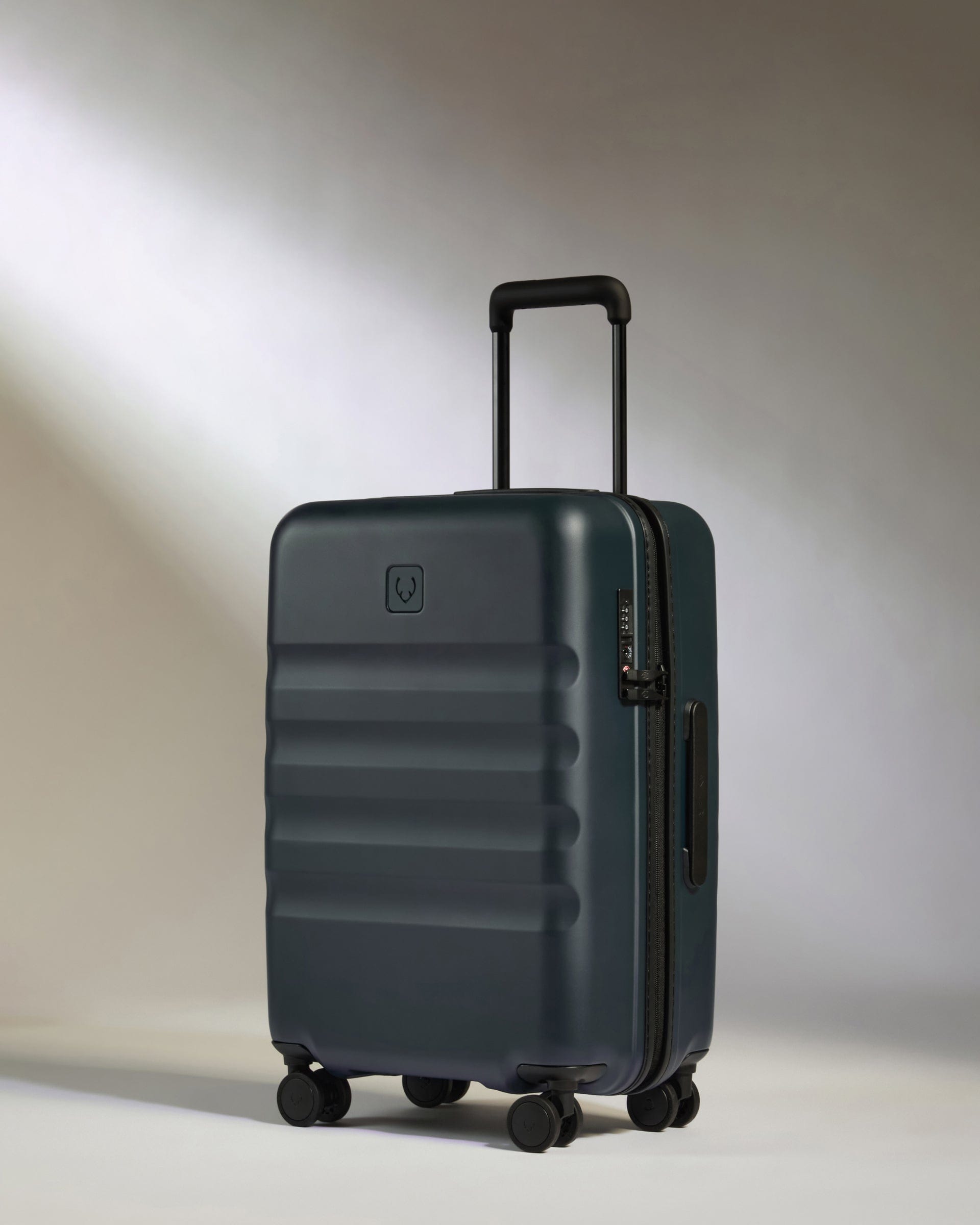 View Antler Icon Stripe Biggest Cabin Suitcase In Indigo Blue Size 24cm x 58cm x 395cm information