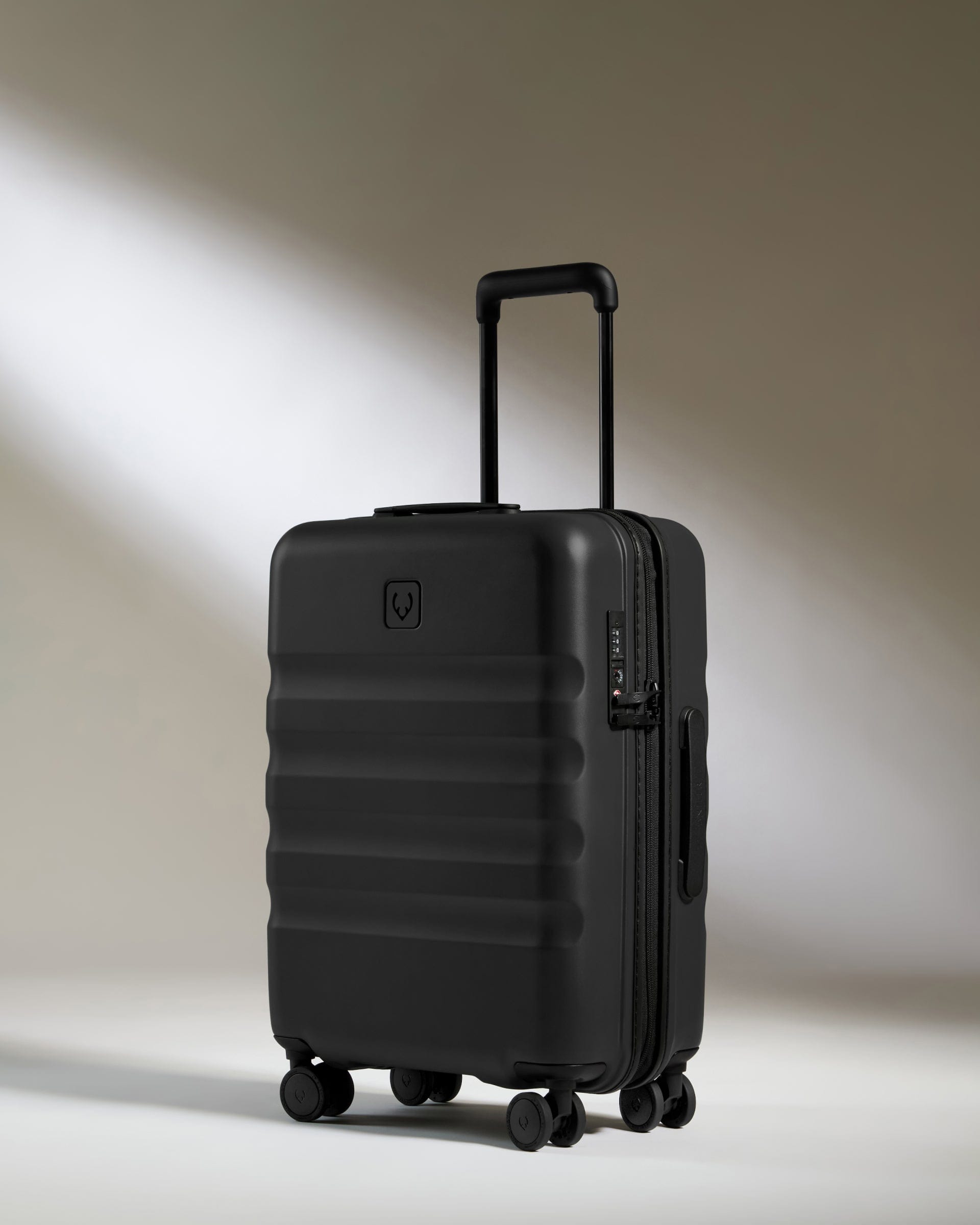 View Antler Icon Stripe Cabin Suitcase In Black Size 20cm x 55cm x 40cm information