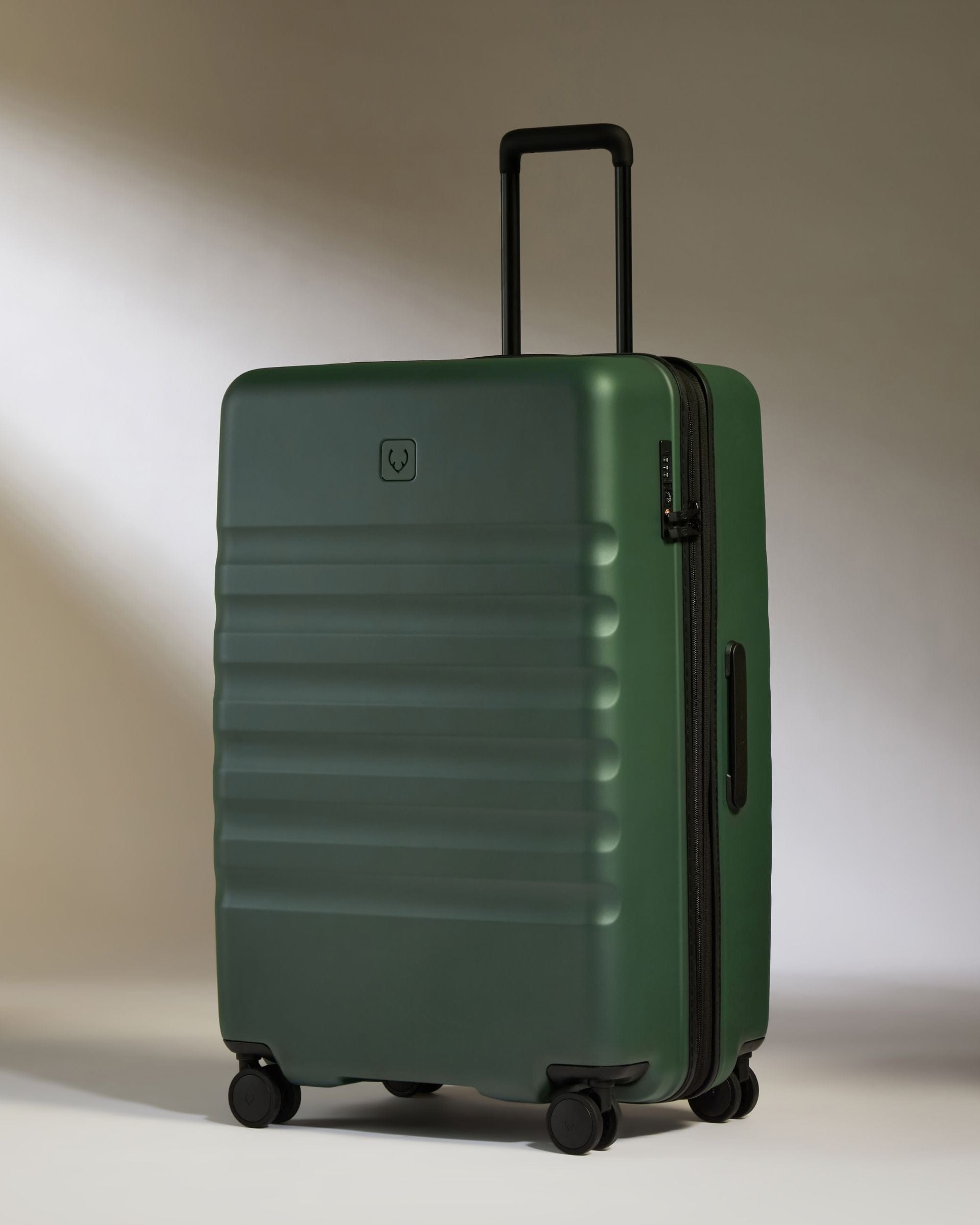 View Icon Stripe Large Suitcase In Antler Green Size 336cm x 78cm x 517cm information