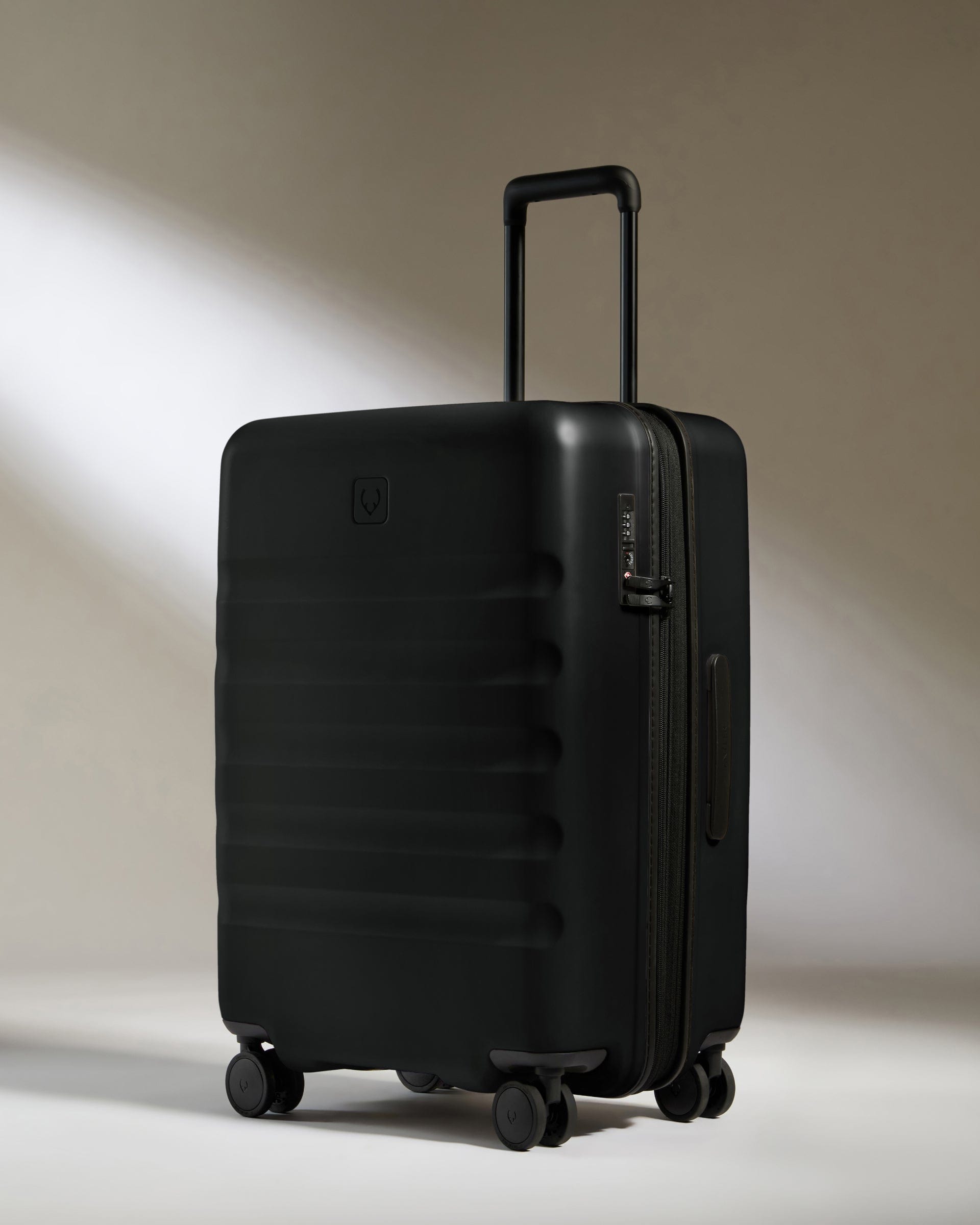 View Antler Icon Stripe Medium Suitcase In Black Size 455cm x 66cm x 30cm information