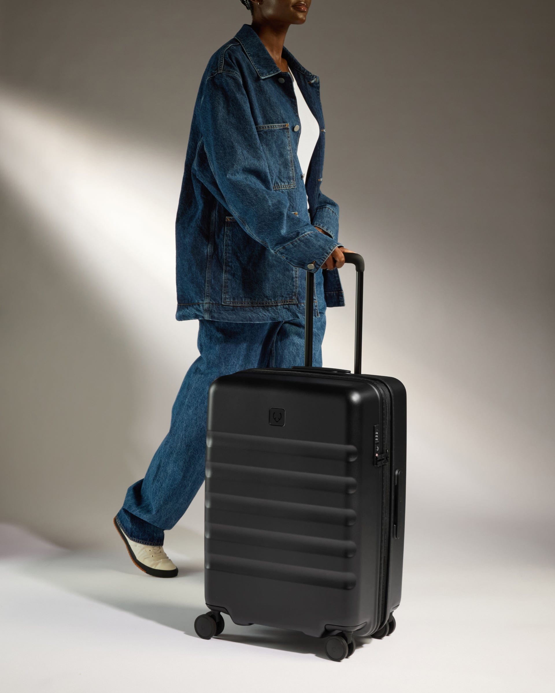 View Antler Icon Stripe Medium Suitcase In Black Size 455cm x 66cm x 30cm information