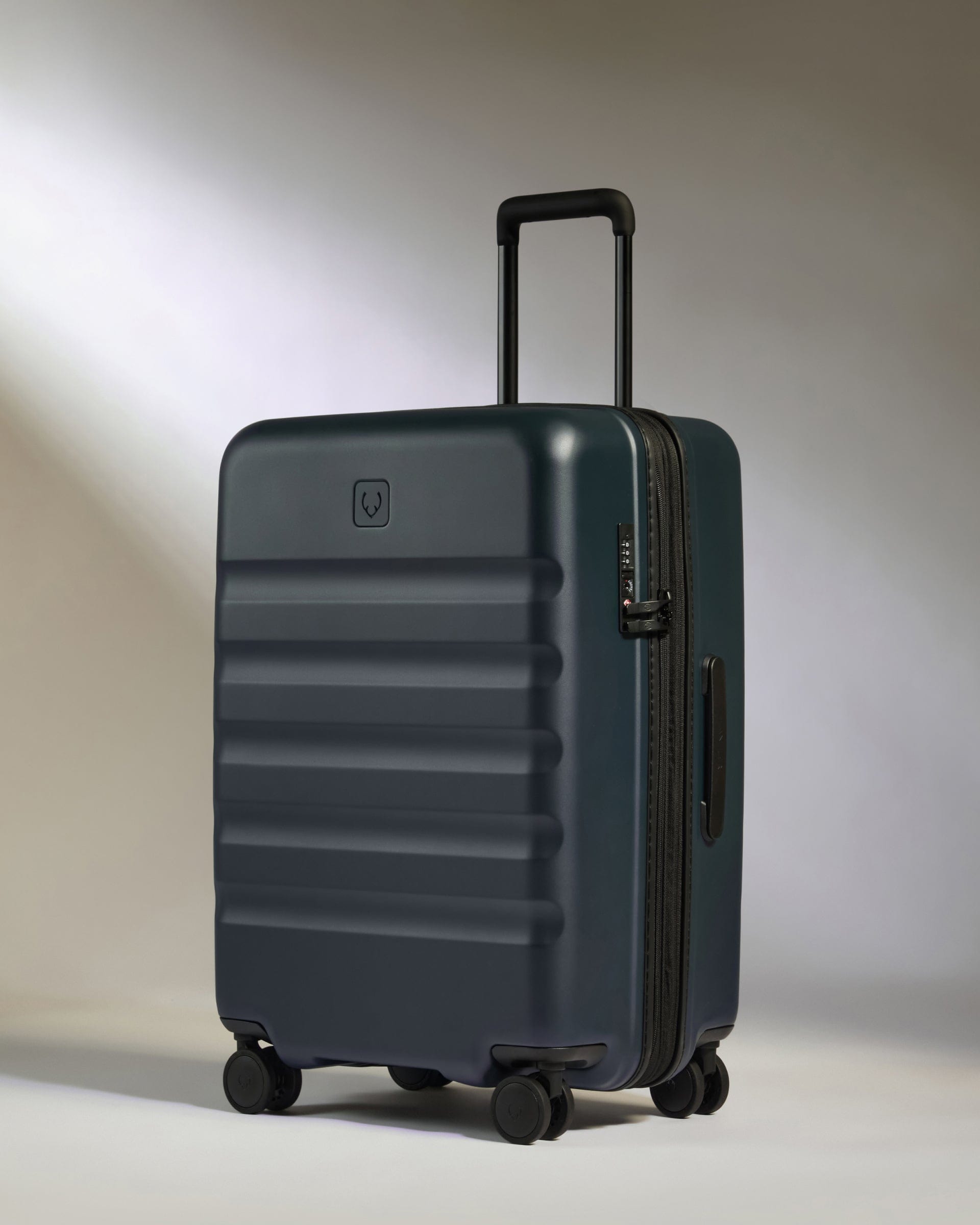 View Antler Icon Stripe Medium Suitcase In Indigo Blue Size 455cm x 66cm x 30cm information