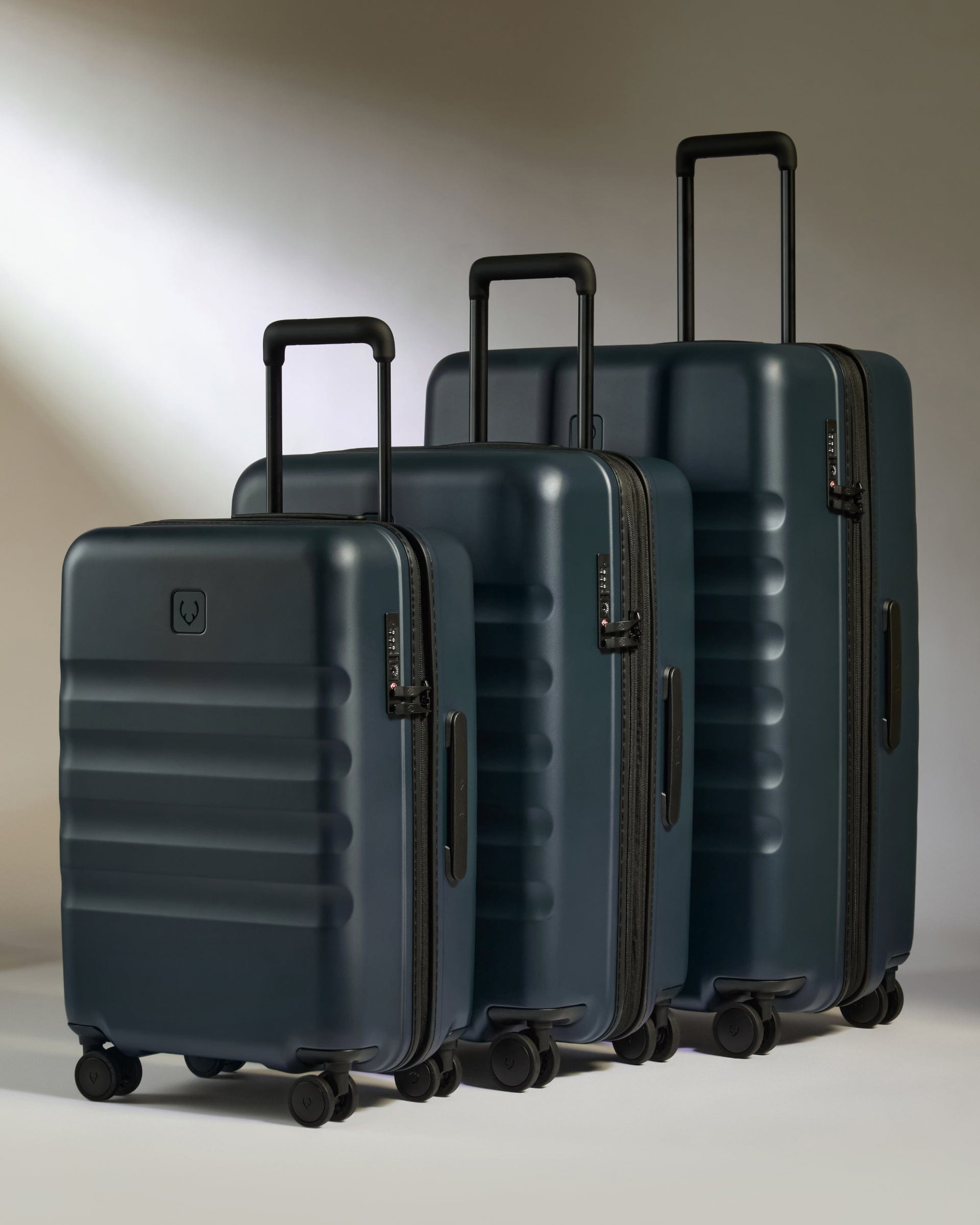 View Antler Icon Stripe Set With Biggest Cabin Suitcase In Indigo Blue information