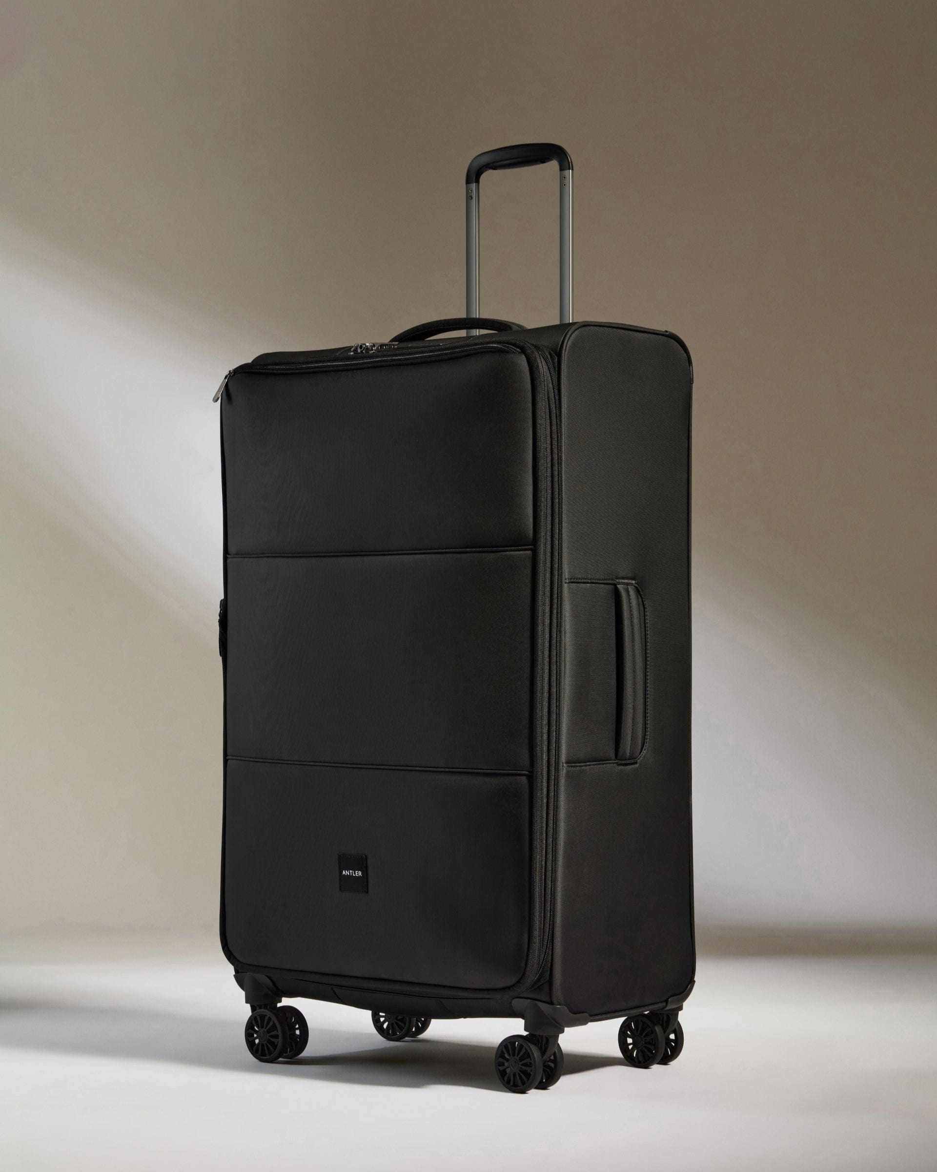 View Antler Soft Stripe Large Suitcase In Black Size 31cm x 83cm x 465cm information