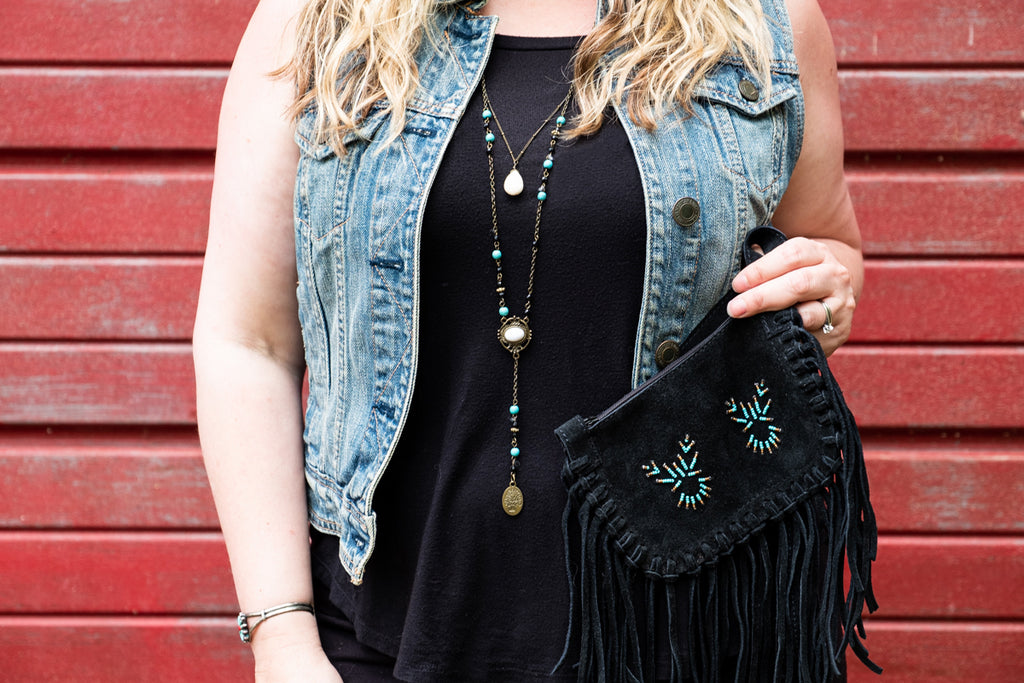 stylish outfit with jean jacket vest and beaded fringed native style purse