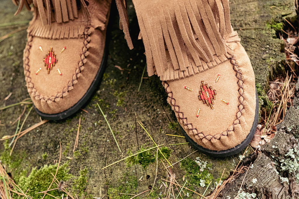 hand-beading on moccasins laurentian chief canada