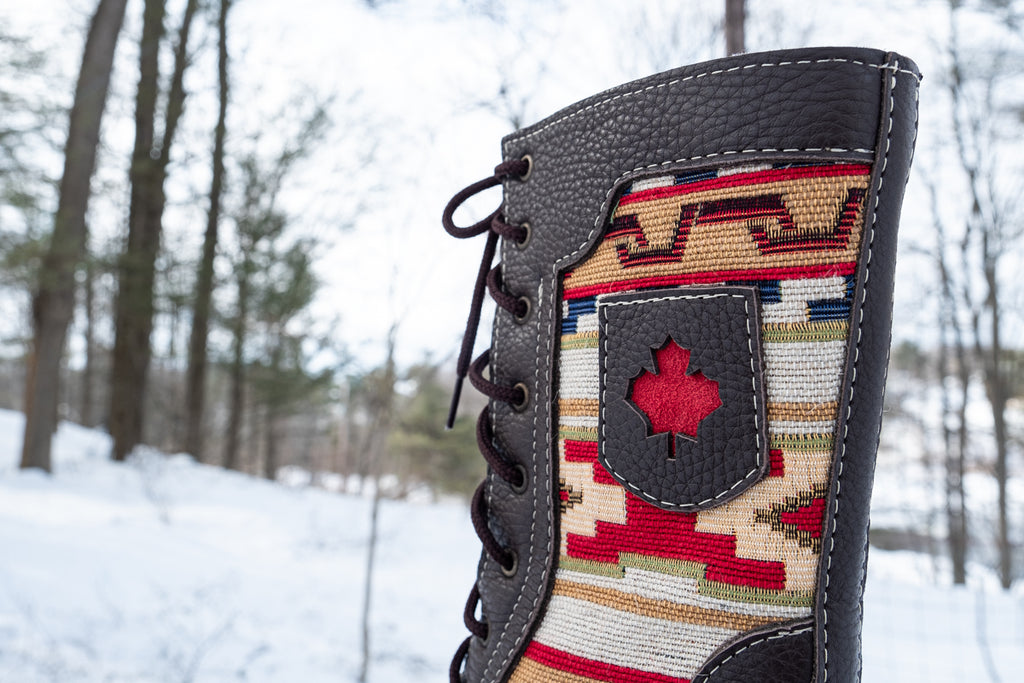 Canadian Made moccasin boots with maple leaf badge