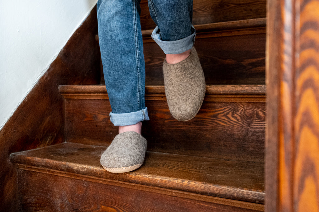 Lightweight and soft, the felted wool slipper wraps around the foot, providing gentle cushioning