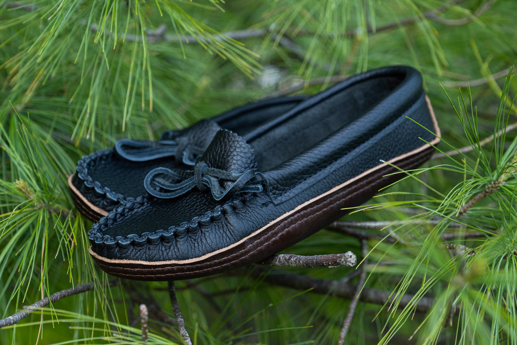 Fashionable women's authentic Native moccasins made with black genuine leather