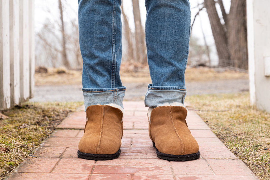 Sheepskin ankle high slippers with side dip warm and cozy for men and women