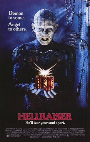 Hellraiser movie poster - features Pinhead, the main villian from the film, holding a puzzle box