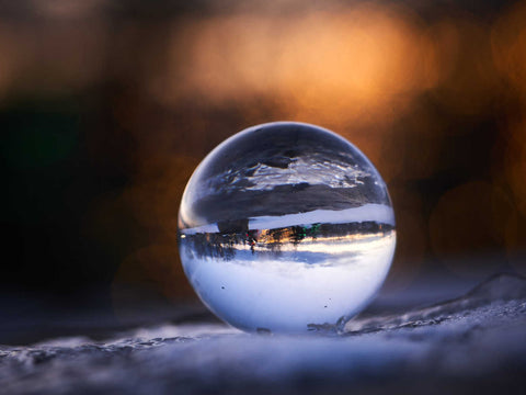Crystal Ball In Wintry Landscape