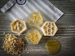 honey and oatmeal hexagon shaped mini soaps with beeds and honeycomb pattern on top
