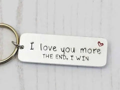 Handstamped keyring that states: I love you more. THE END, I WIN